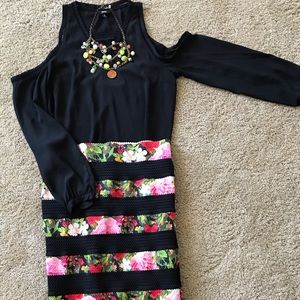 Shoulders exposing long sleeve blouse